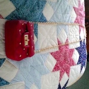 A beautiful red and gold dress coin purse